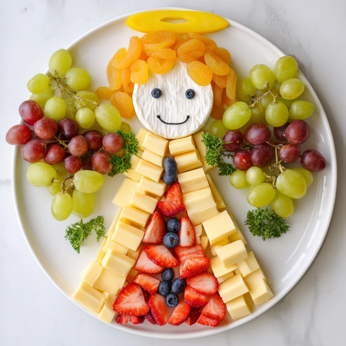 Delectable Cherub Angel Snack Tray with fresh fruit, cheeses, and sweet treats in a party platter.