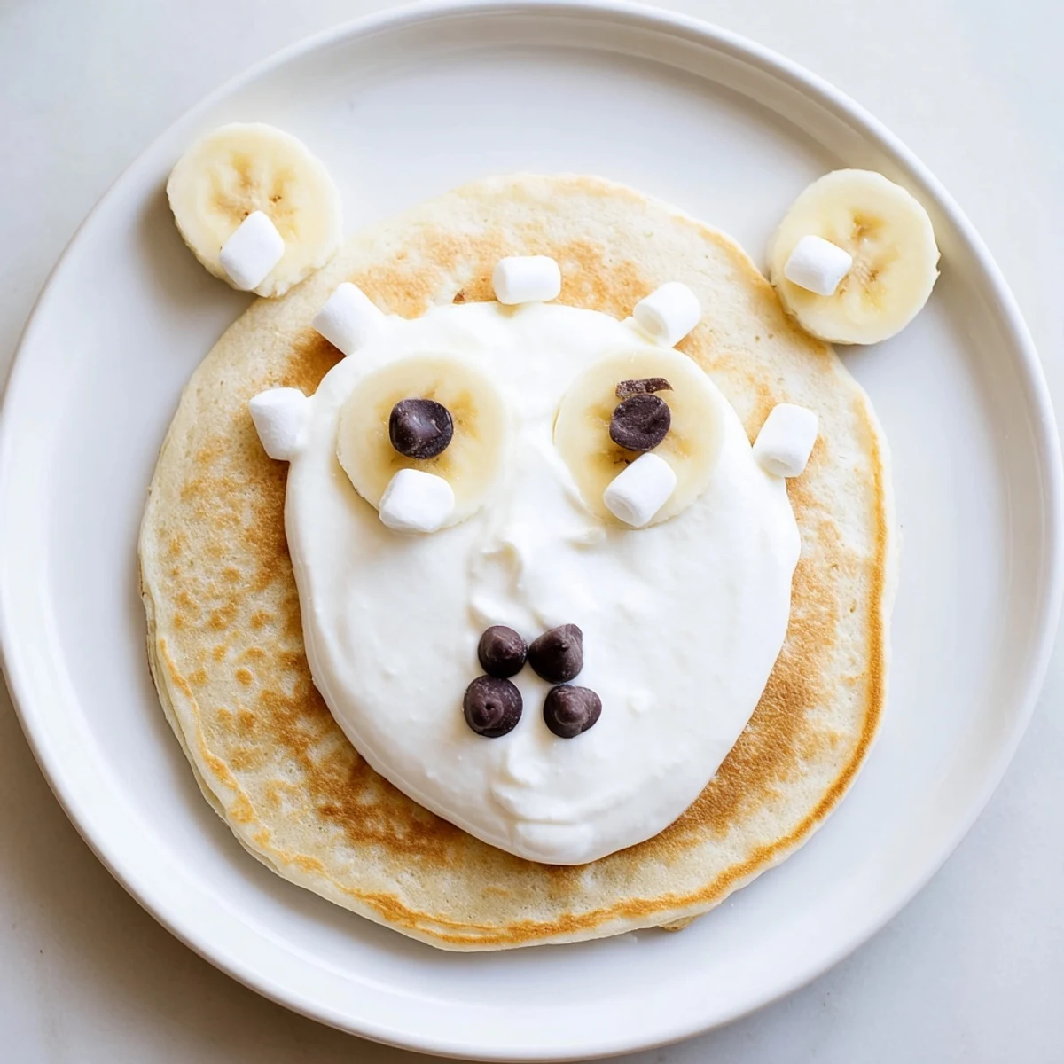 Fluffy Polar Bear Pancake Stack Board with fresh fruit and whipped cream for a whimsical brunch.