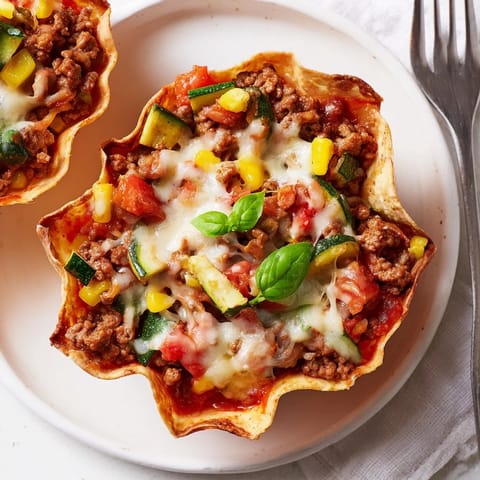 Savor the bold flavors of Lasagne Soup Nacho Boats in crunchy tortilla chips.  