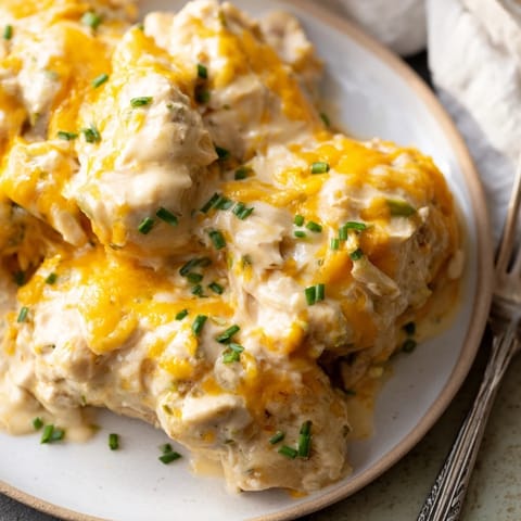 Juicy chicken breasts coated in creamy ranch and melted cheddar cheese casserole.  