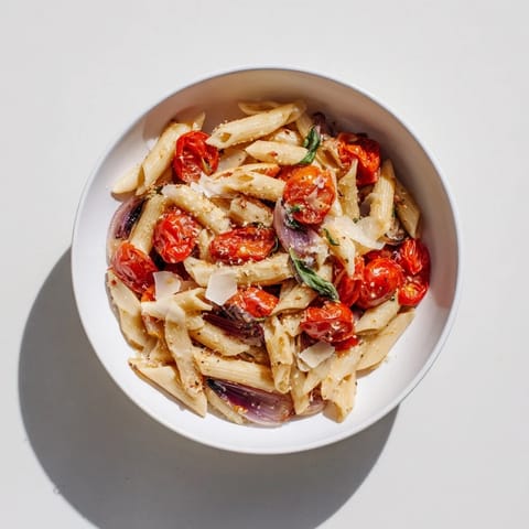 Golden, roasted tomatoes in the Baked Tomato & Olive Oil Pasta, ready to mix with perfectly cooked pasta.