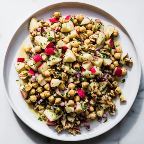 A close-up view of the delicious Fall Harvest Apple and Chickpea Salad, showcasing its fresh ingredients.