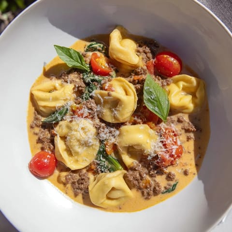 Creamy and savory Tortellini Beef Soup loaded with tender tortellini and ground beef.