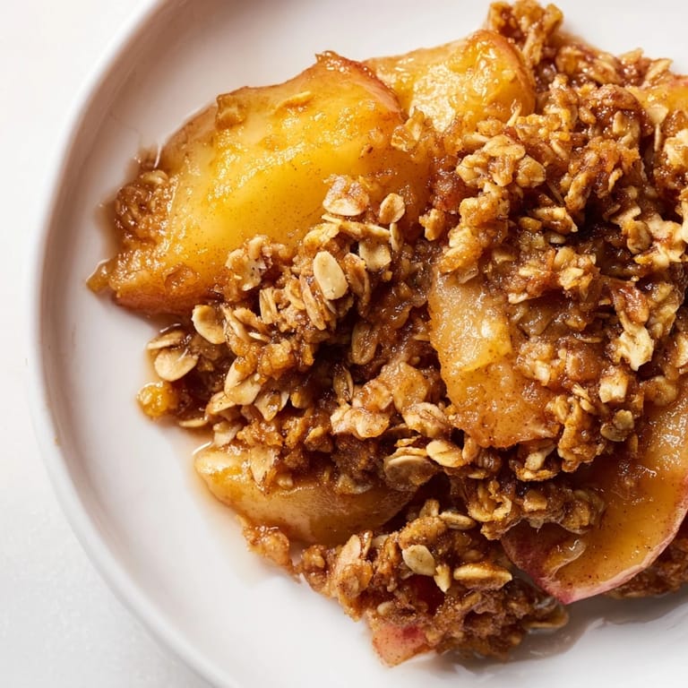 Homemade apple crisp with frozen apples is ready to serve, a comforting American dessert.