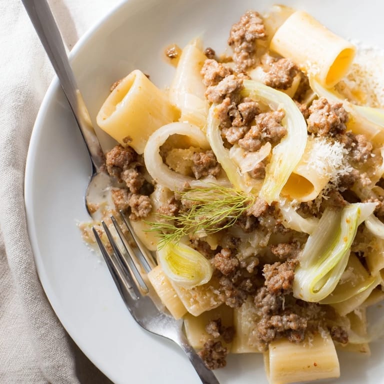 Hearty Winter Pasta with Sausage and Fennel served in a rustic bowl, perfect for a cozy family dinner.